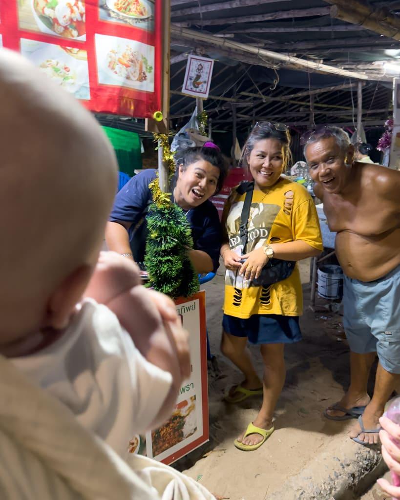 Thai people smile at baby