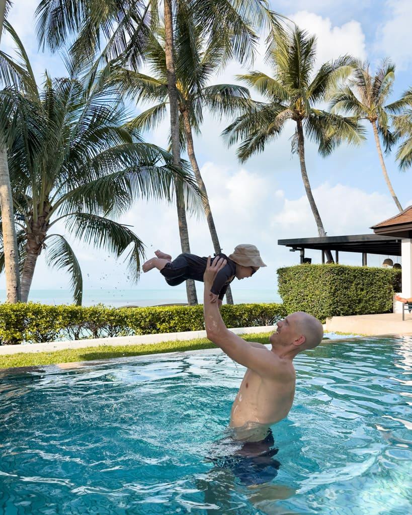 Alex with Adrian in the pool