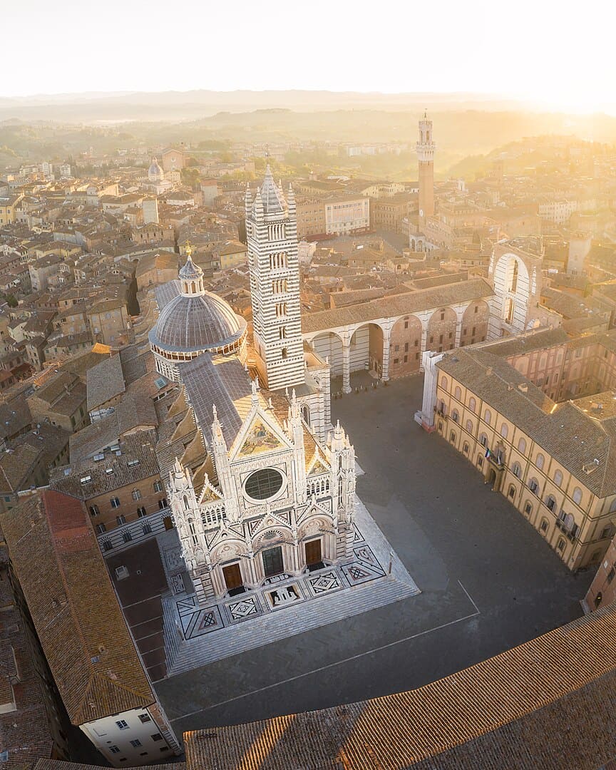 Il Duomo at sunrise from a drone