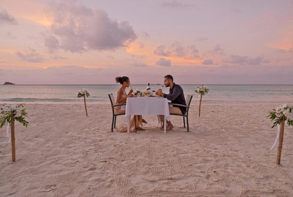 Dinner at the beach in front of Acajou Beach Resort on Praslin