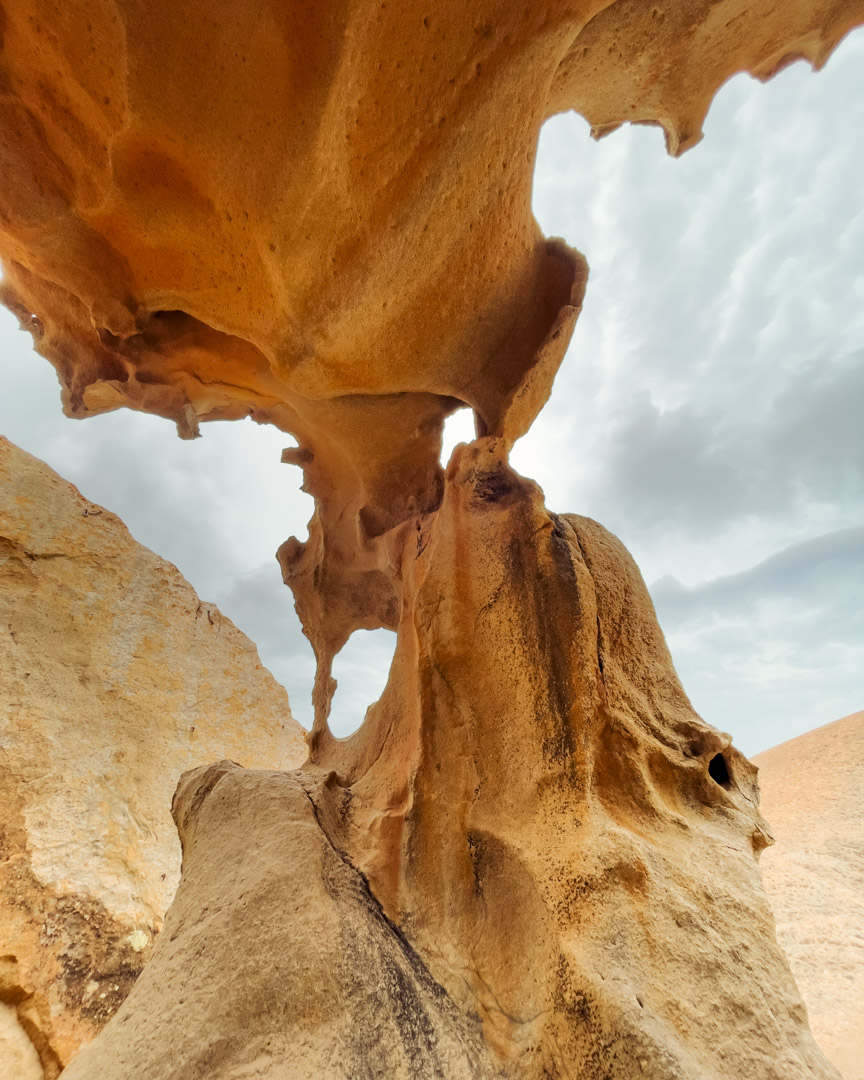 Arco de las Penitas has several small holes in it