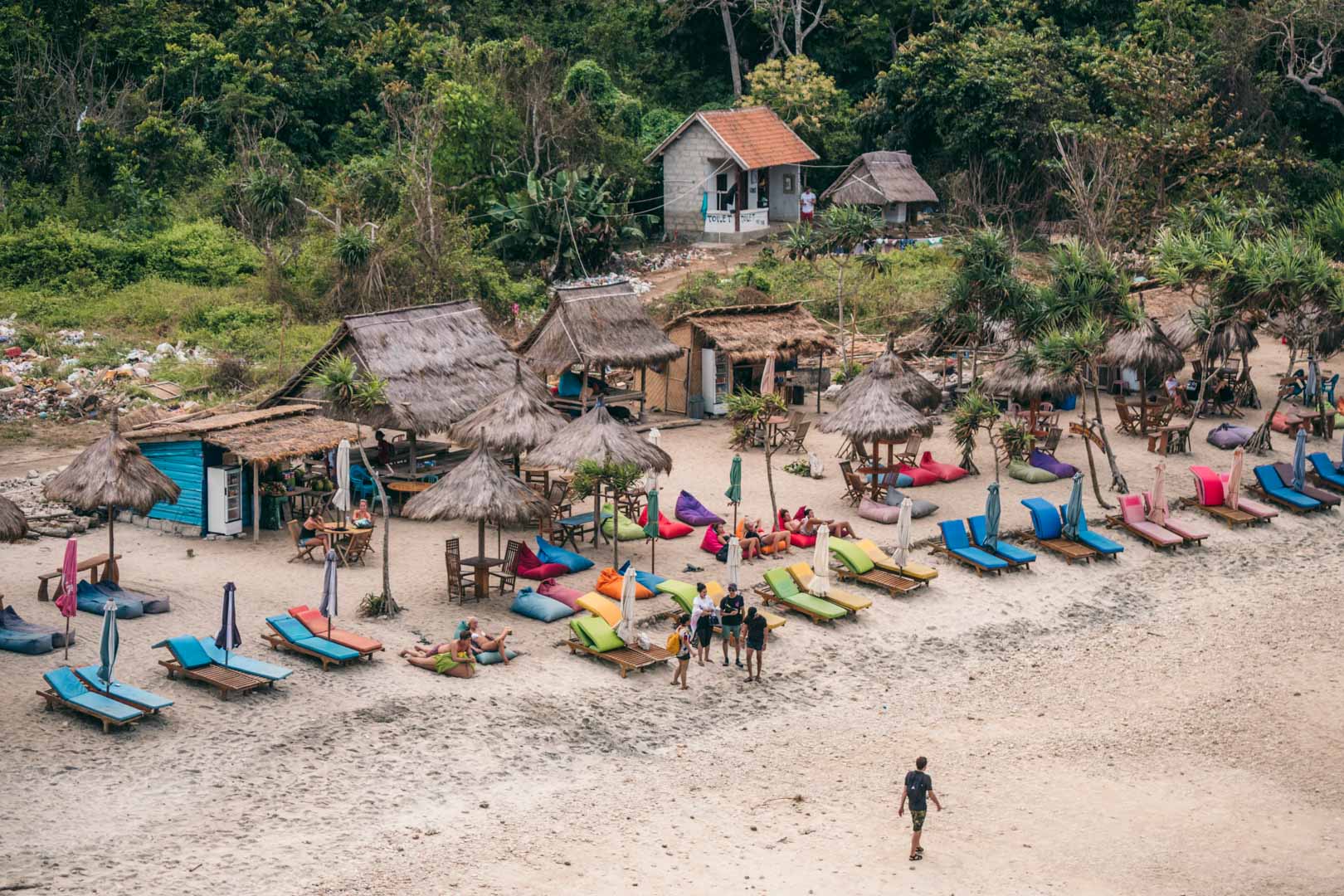 Atuh Beach sun loungers and warungs