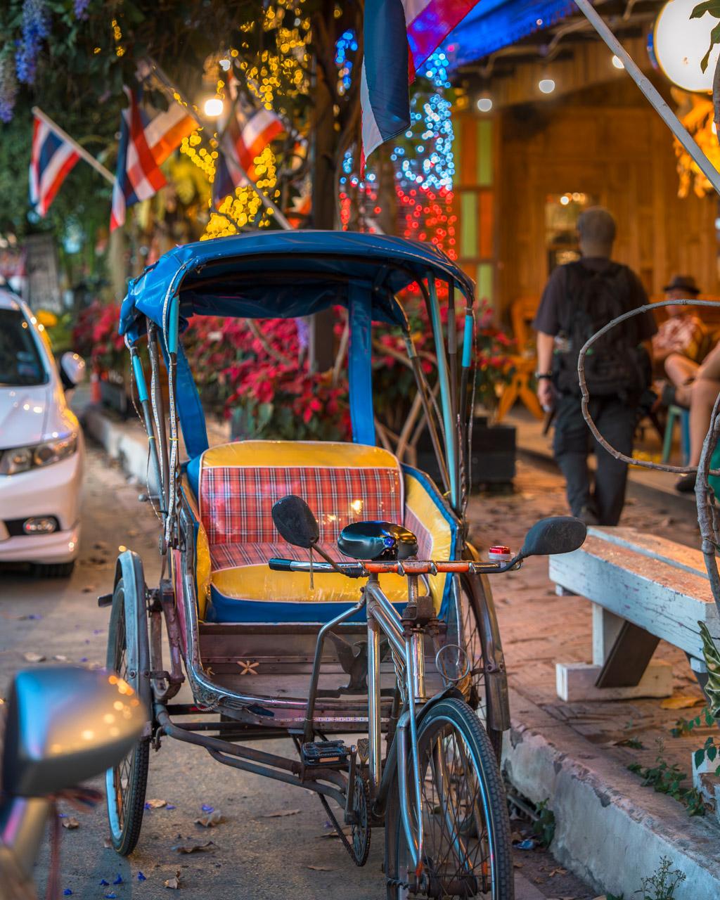 Cycle rickshaw in Ayutthaya parked by the sidewalk
