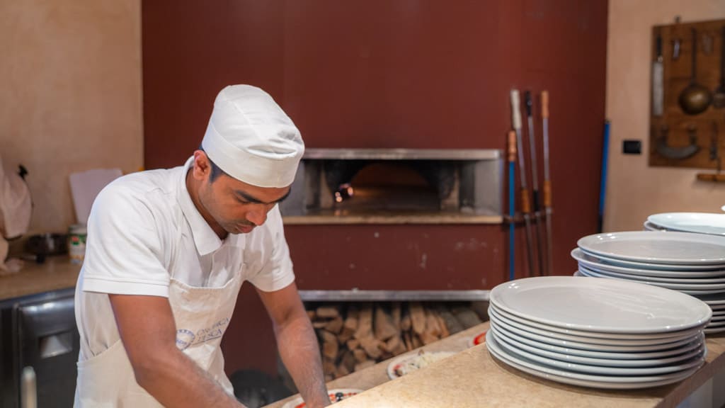 Pizzas in the making in Bergamo