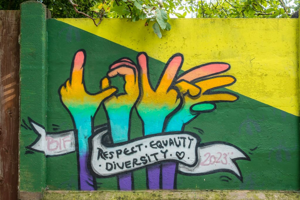 Street art saying "Love, respect, equality, diversity"