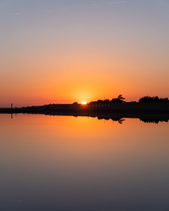 Sunset in Büsum over the lagoon