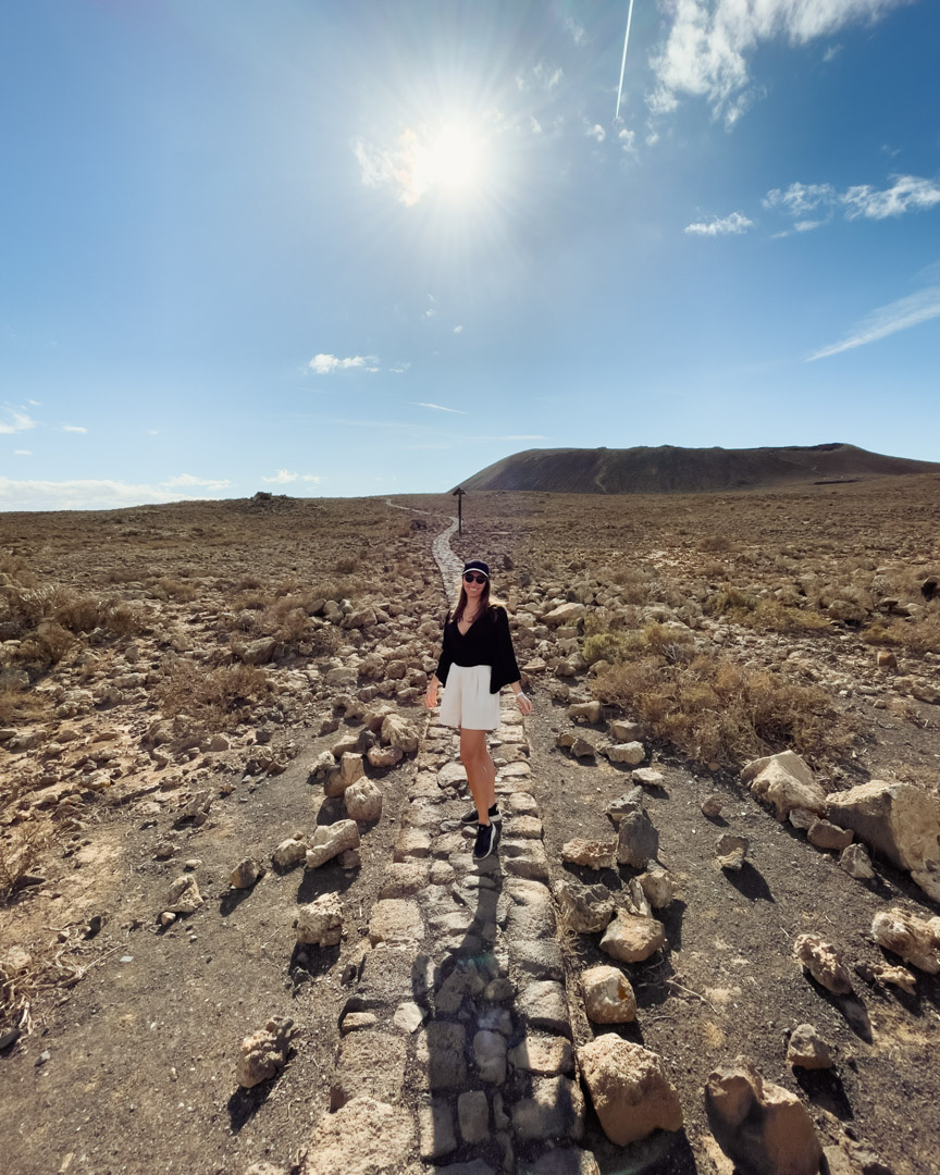 Victoria on the path to Calderon Hondo volcano in Fuerteventura