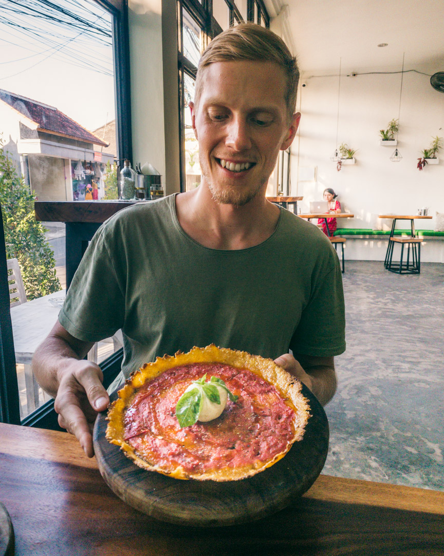 Gluten-free pizza with pumpkin crust and vegan burrata