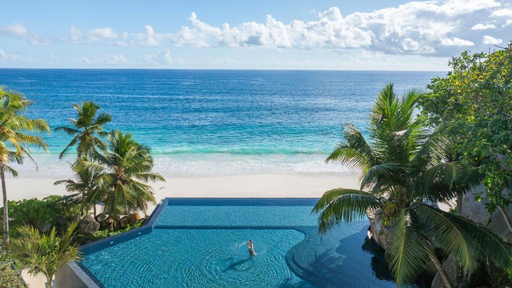 Cheval Blanc Seychelles pool by the ocean