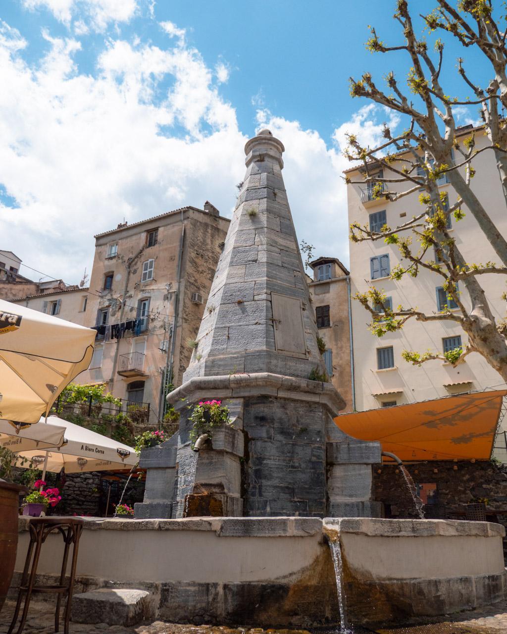 La Fontaine des Quatre-Canons stands on a small square below the citadel with its four spouts and obelisk topped by a cannonball