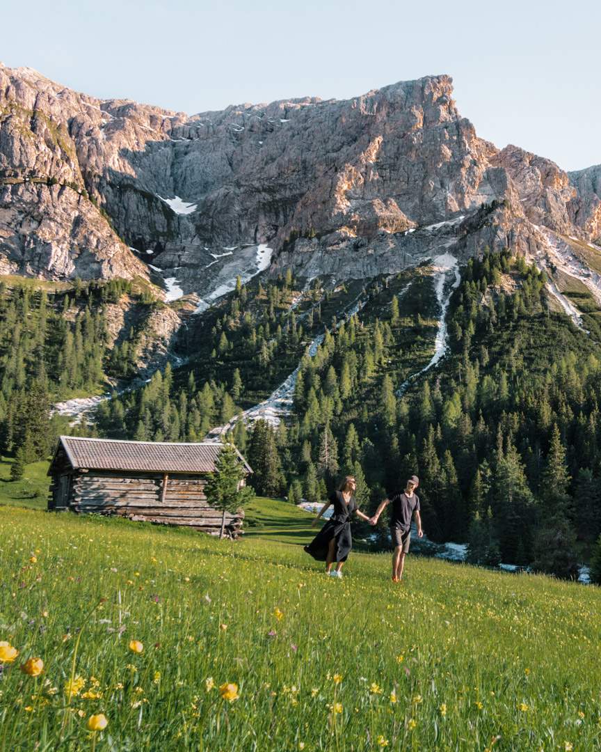 Alex and Victoria on a meadow in the Dolomites