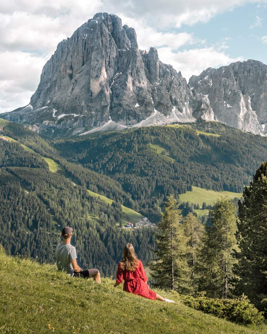 Alex & Victoria looking towards Sassolungo from the hike in the Gardena valley