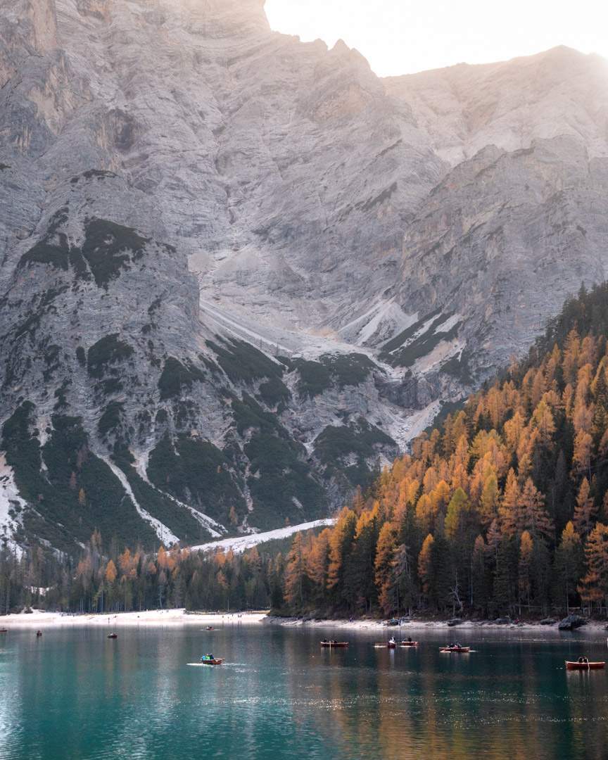 Boats on Lago di Braies lake in the Dolomites