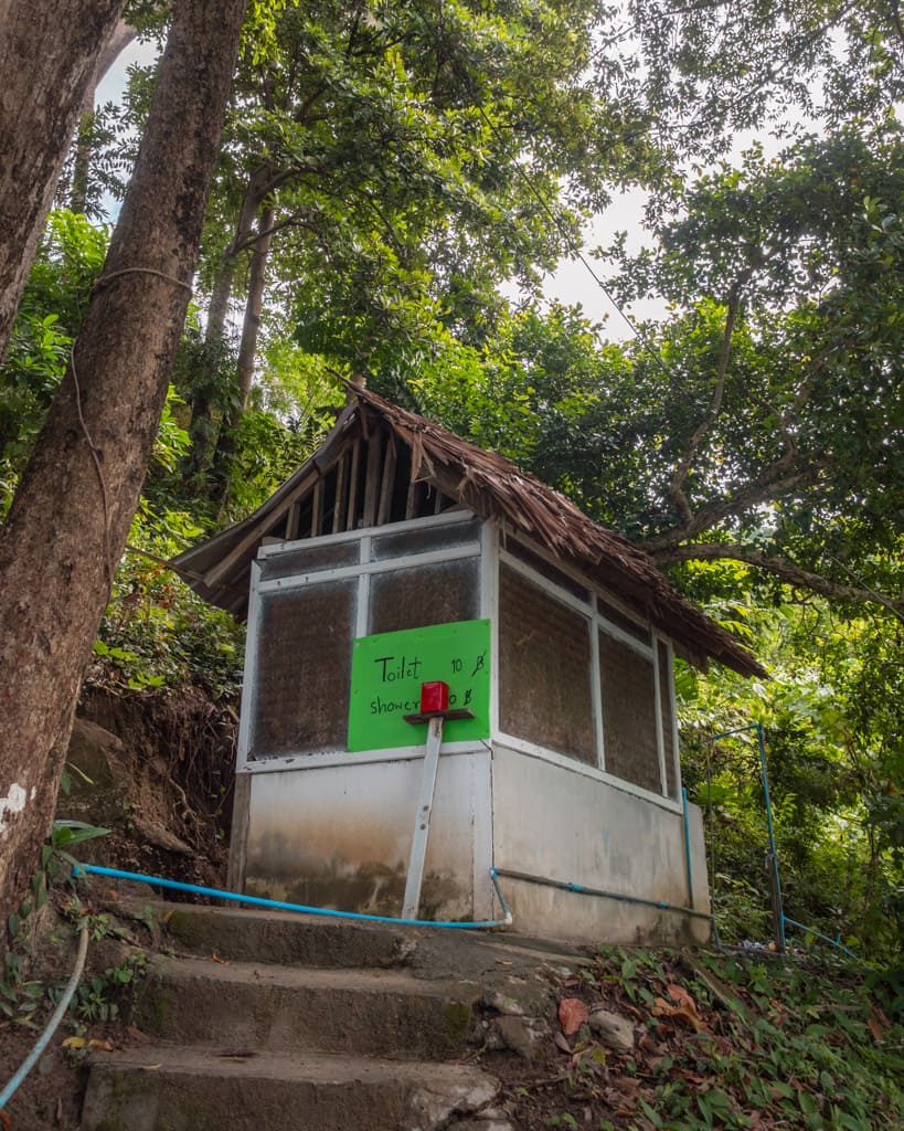 Closed toilet and bath at Freedom Beach