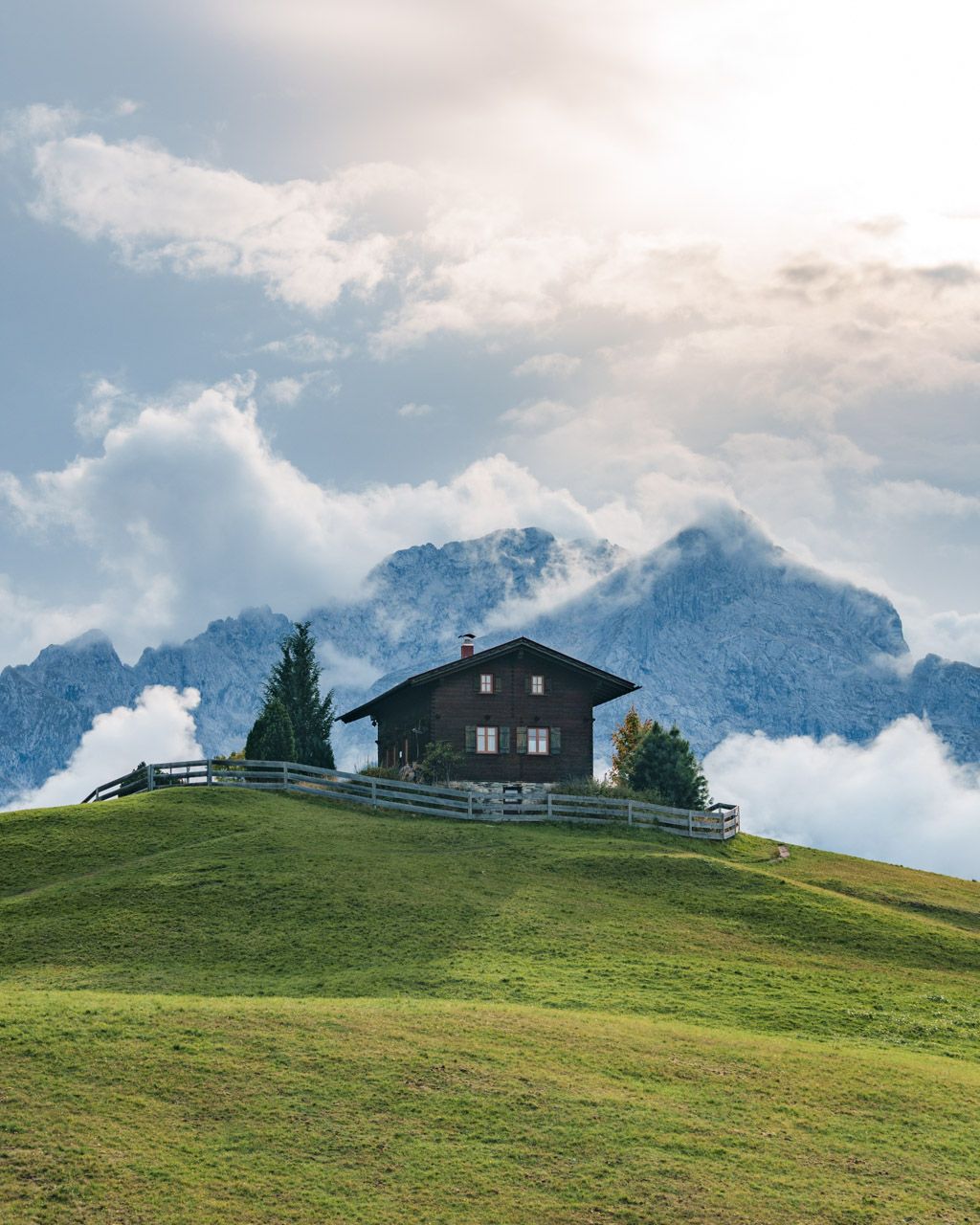 Wooden hut near Eckbauer with the Wetterstein range behind