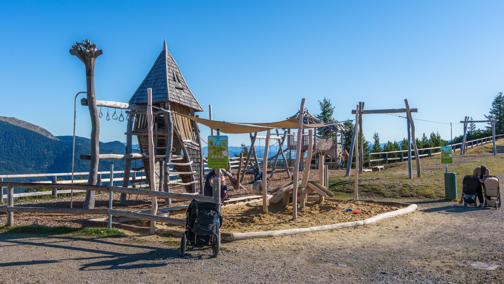 Panorama playground at the Wank summit with wooden tower and sand pit