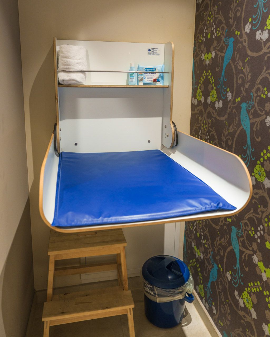 Baby changing station with supplies in the room at Leiners