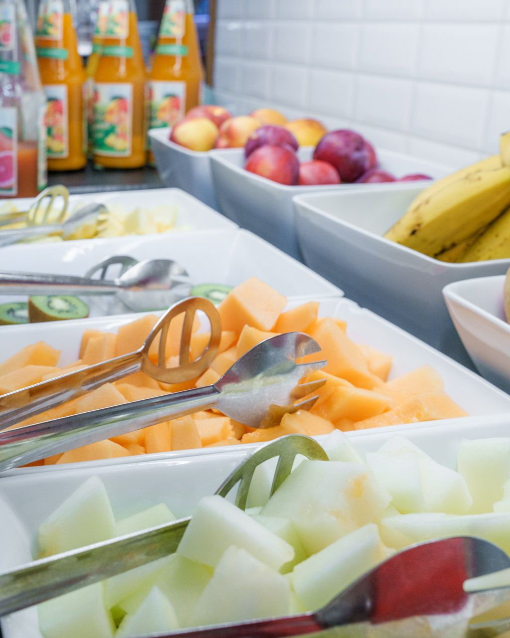 Fresh fruit and juices at the breakfast buffet