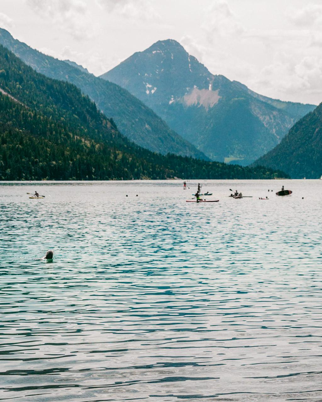Boats and paddleboards on Lake Eibsee