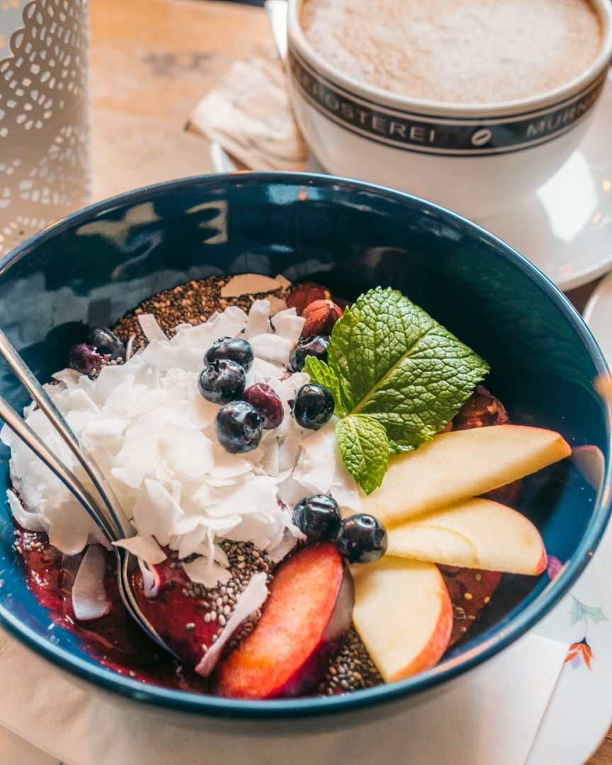 Açaí bowl with coconut flakes, blueberries, chia seeds and fruit