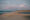 The beach and lighthouse at Grenen in Skagen