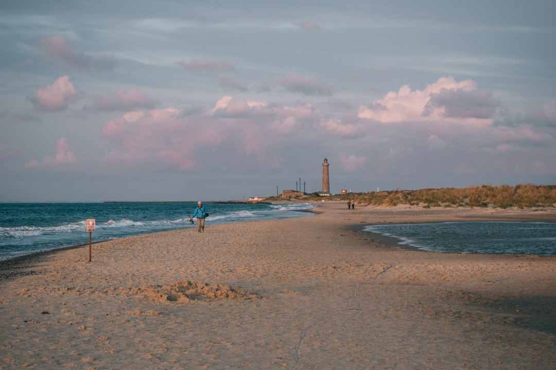 The beach and lighthouse at Grenen in Skagen
