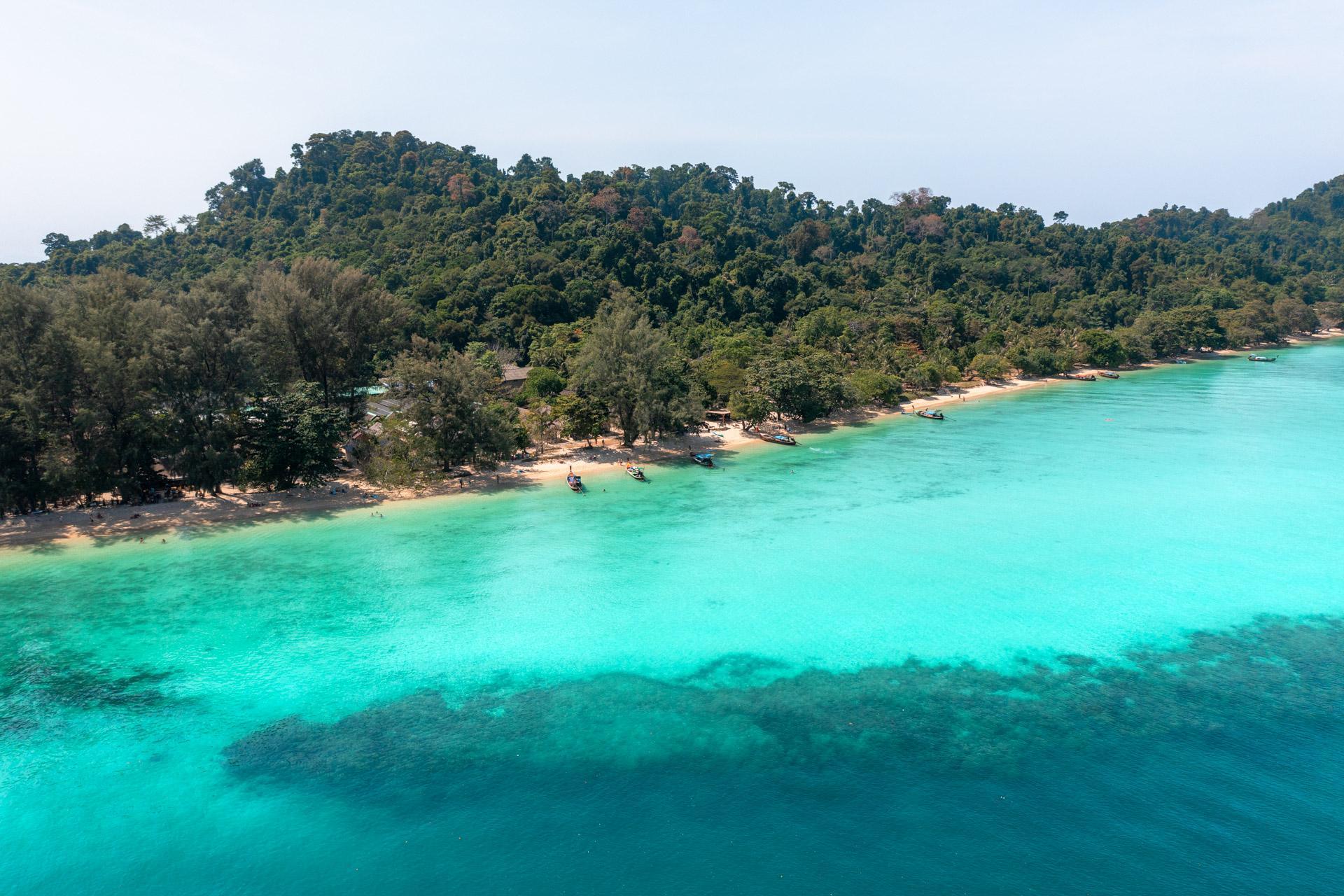 Koh Kradan drone shot showing the reef, beach and landscape