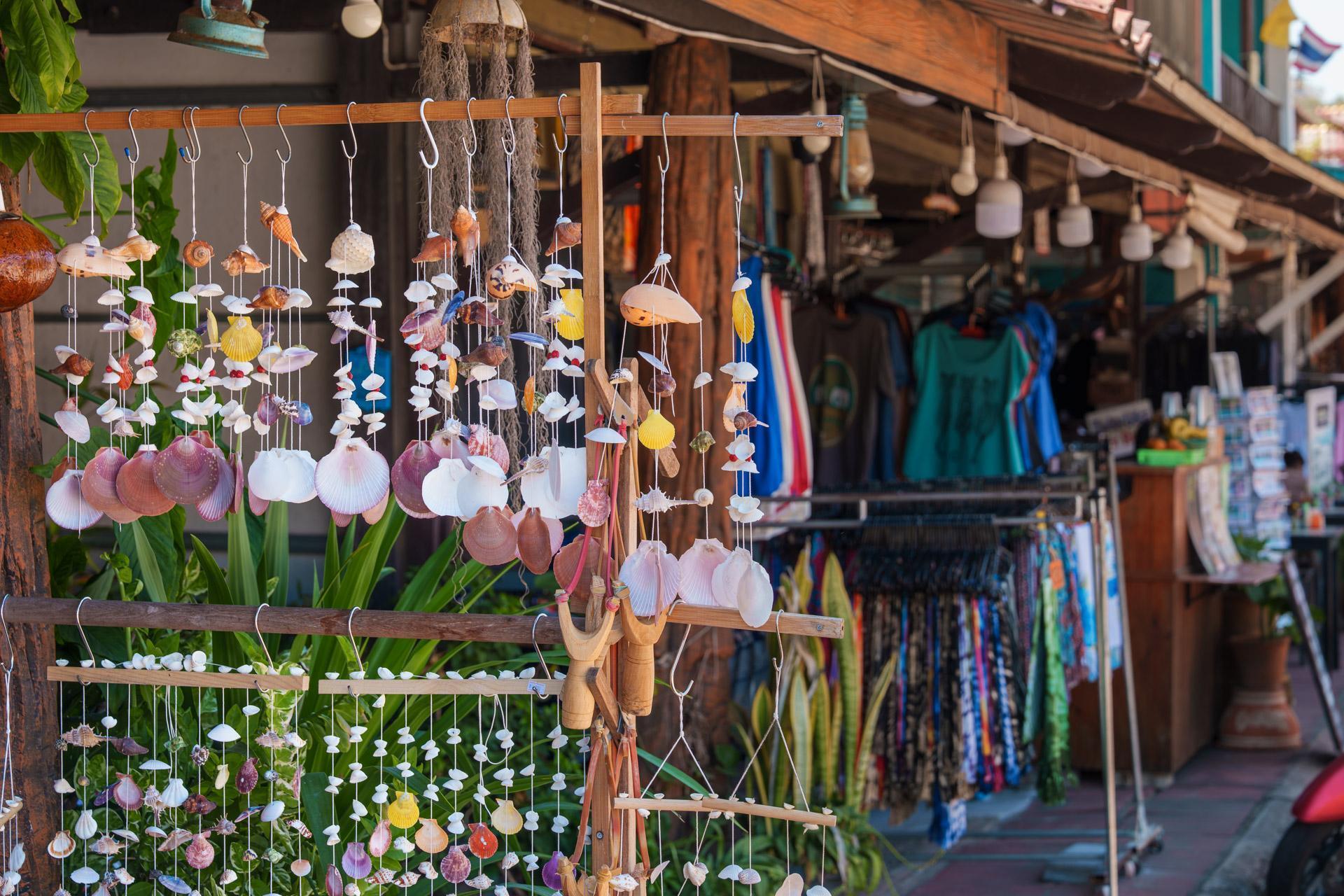 Koh Lanta's old town, zoom on some tourist trinkets and clothes in the background