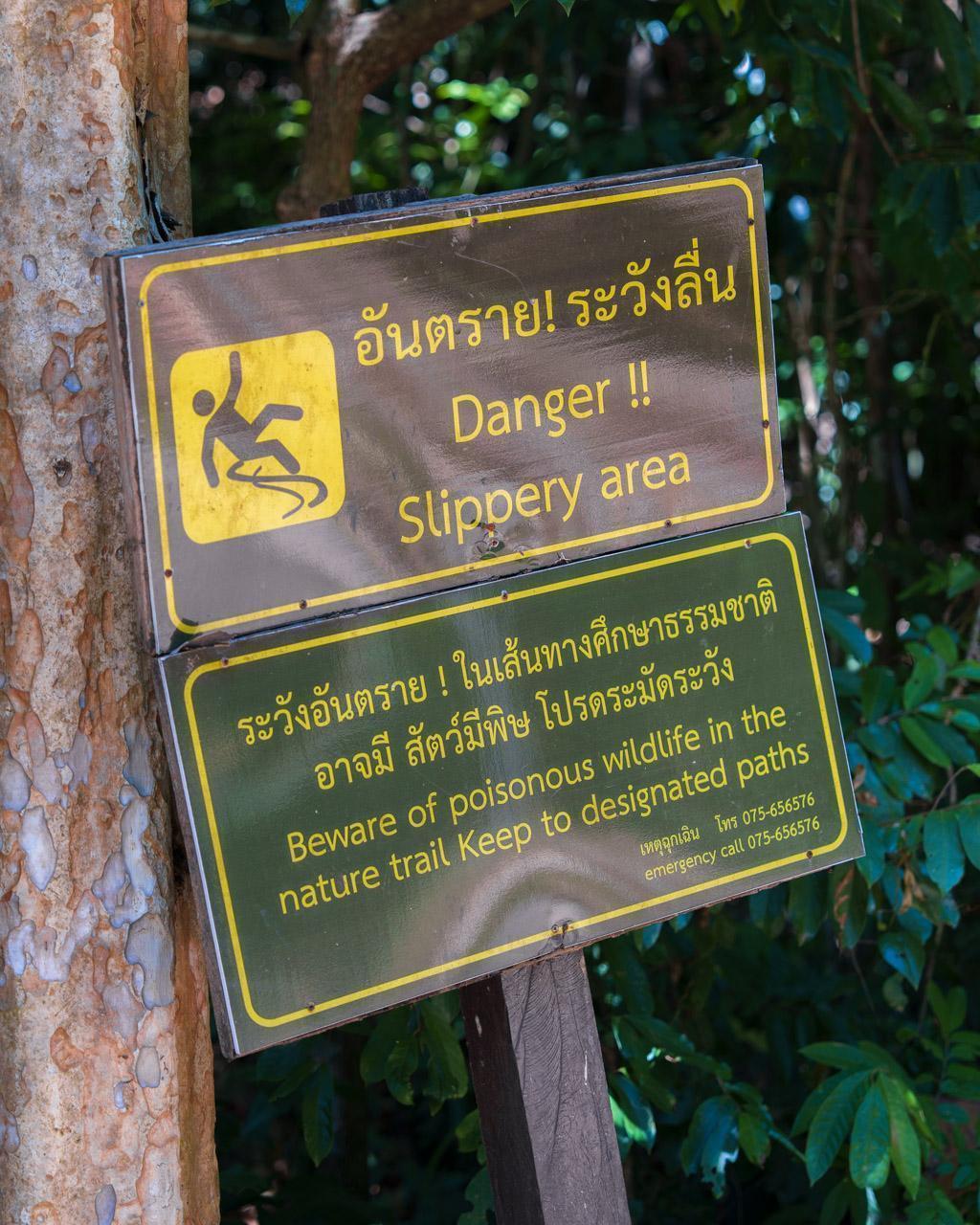 Sign saying "Danger !! Slippery area"