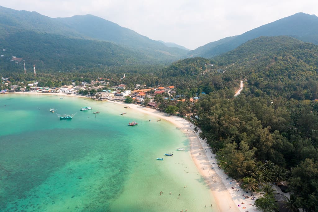 Chaloklum Bay with Chaloklum Beach and a part of Malibu Beach as seen from a drone