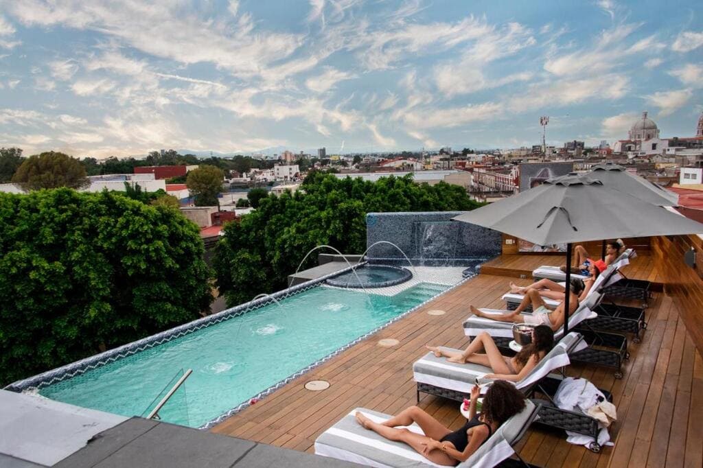 The rooftop pool at L'Hotel Perla Boutique
