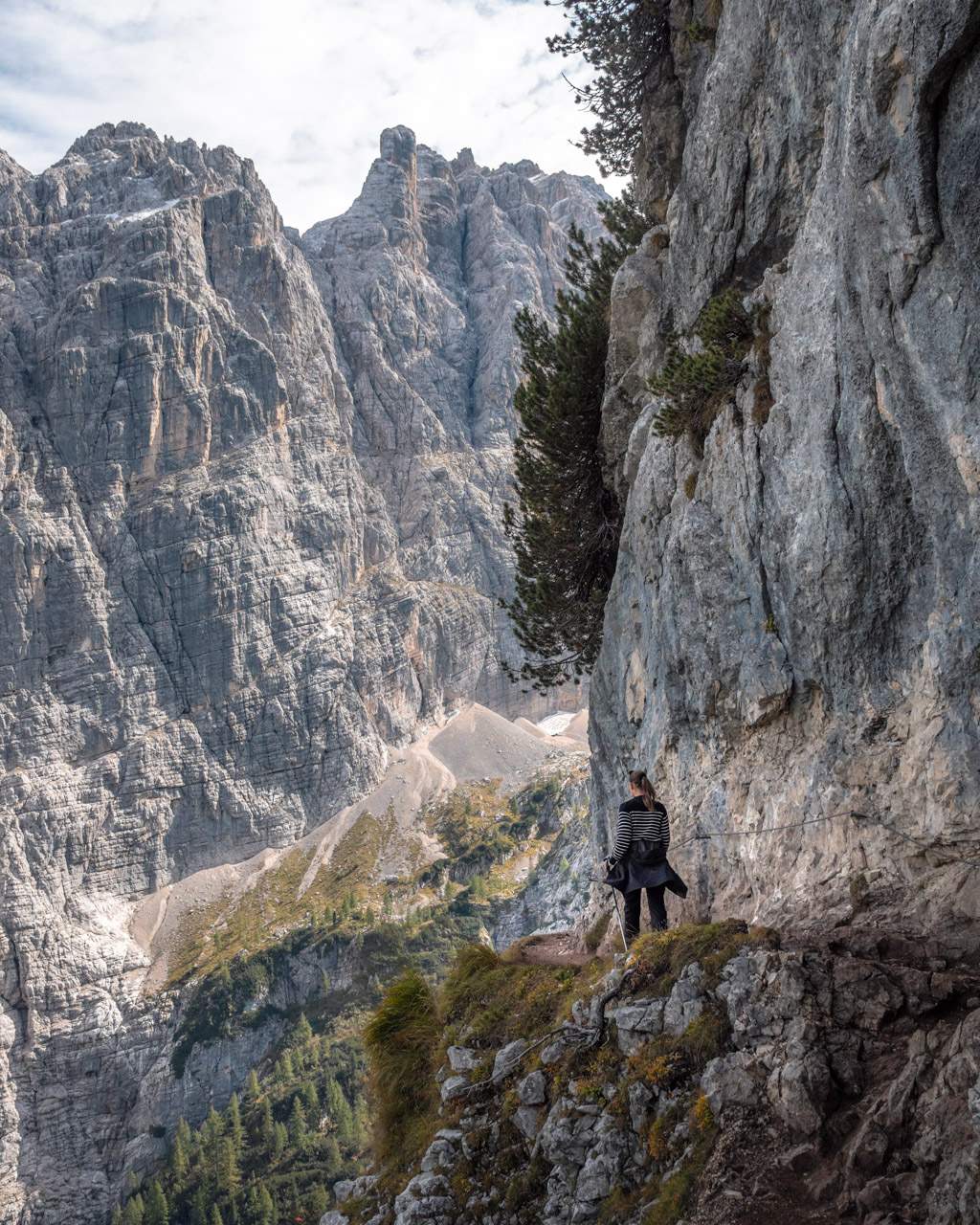Victoria on the path to Lago di Sorapis along the rock wall