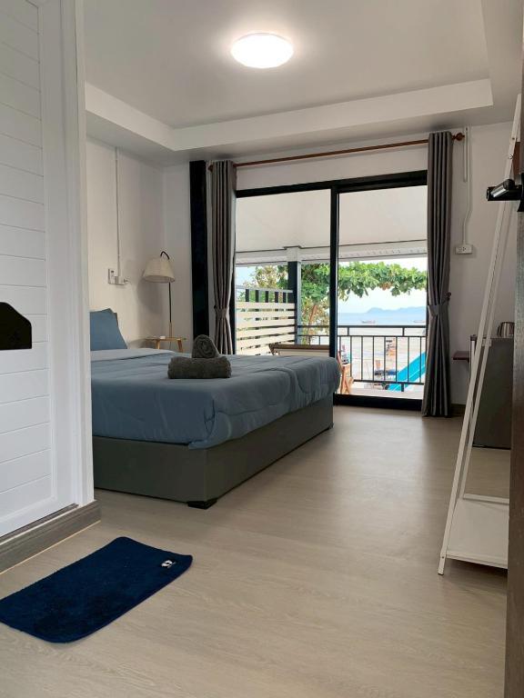 Interior of a room at Mook Tawan Beach House with a clean, contemporary feel.