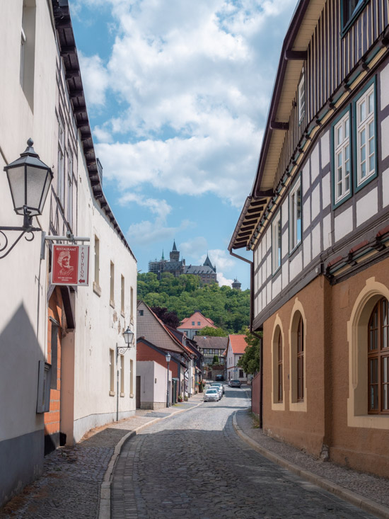 The Wernigerode Castle in between the half-timbered houses of Wernigerode