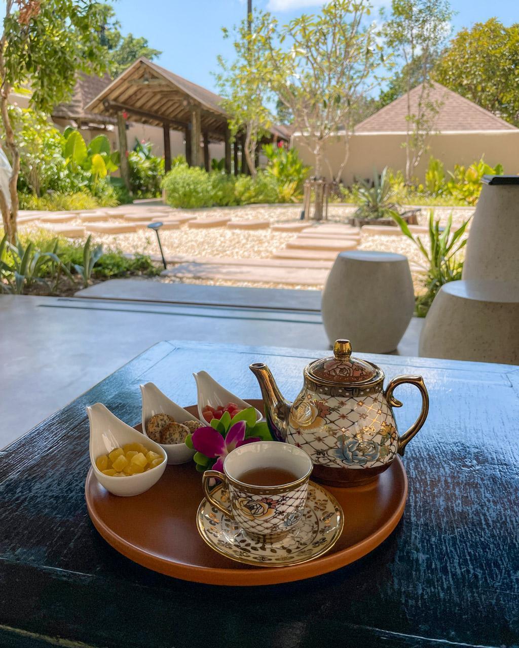 Tea and snacks in the garden after a massage at The Naka Island spa