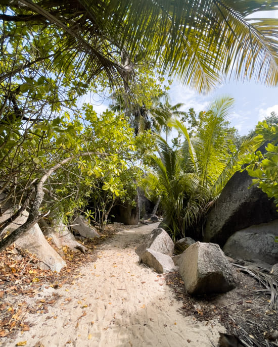 Walking from one beach to the next on Anse Source d'Argent