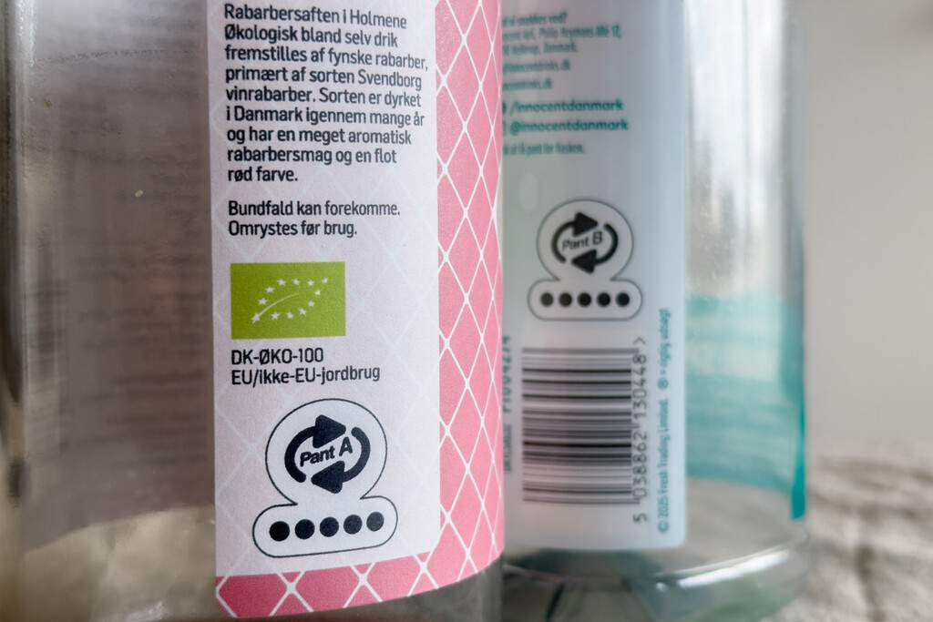 Pant A and Pant B on two glass bottles in Denmark