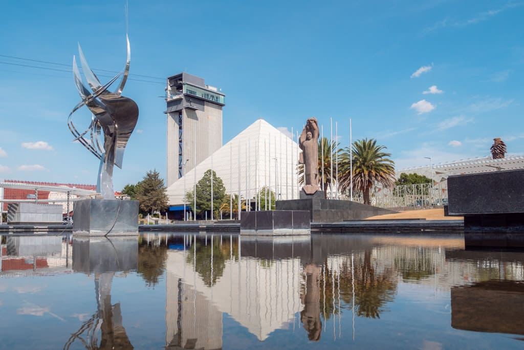 The Museum of the Evolution of Puebla and the pyramid-shaped Puebla Planetarium