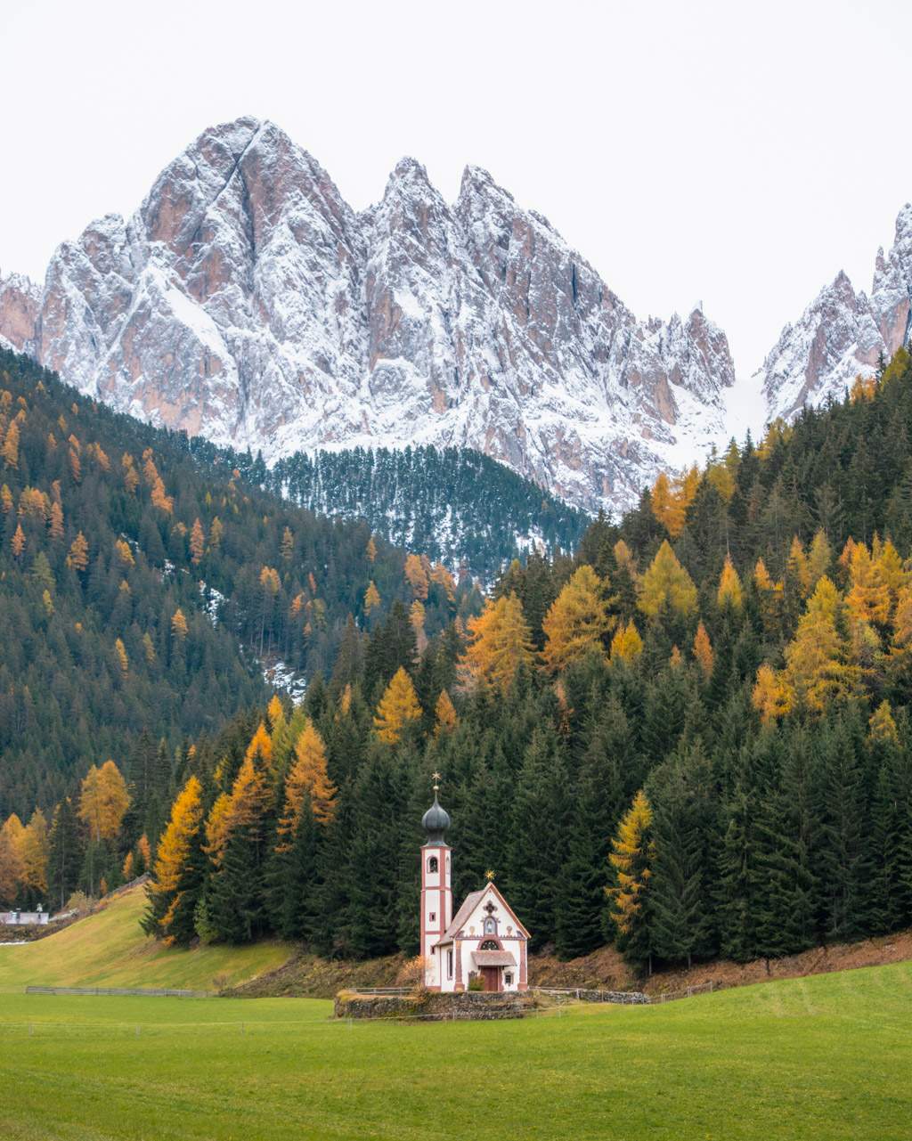 San Giovanni church with mountains in the background