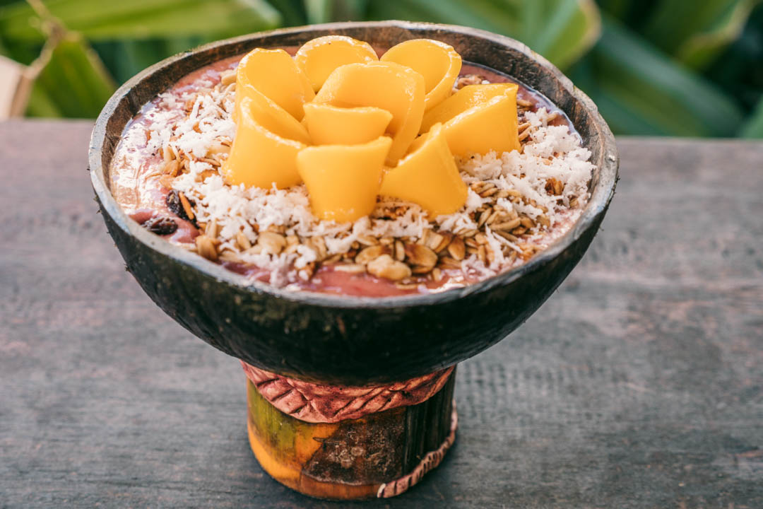 A delicious smoothie bowl with ripe mango