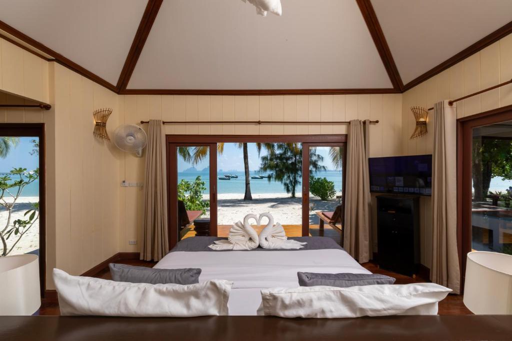 Interior of a villa at Sivalai Beach Resort on Koh Mook with wooden furnishings and natural light.