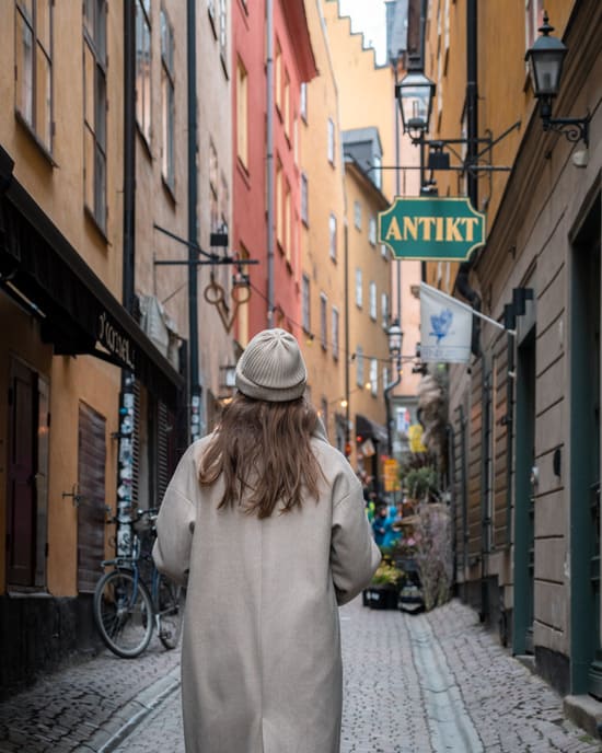 Victoria in a colourful street in Stockholm's Gamla Stan