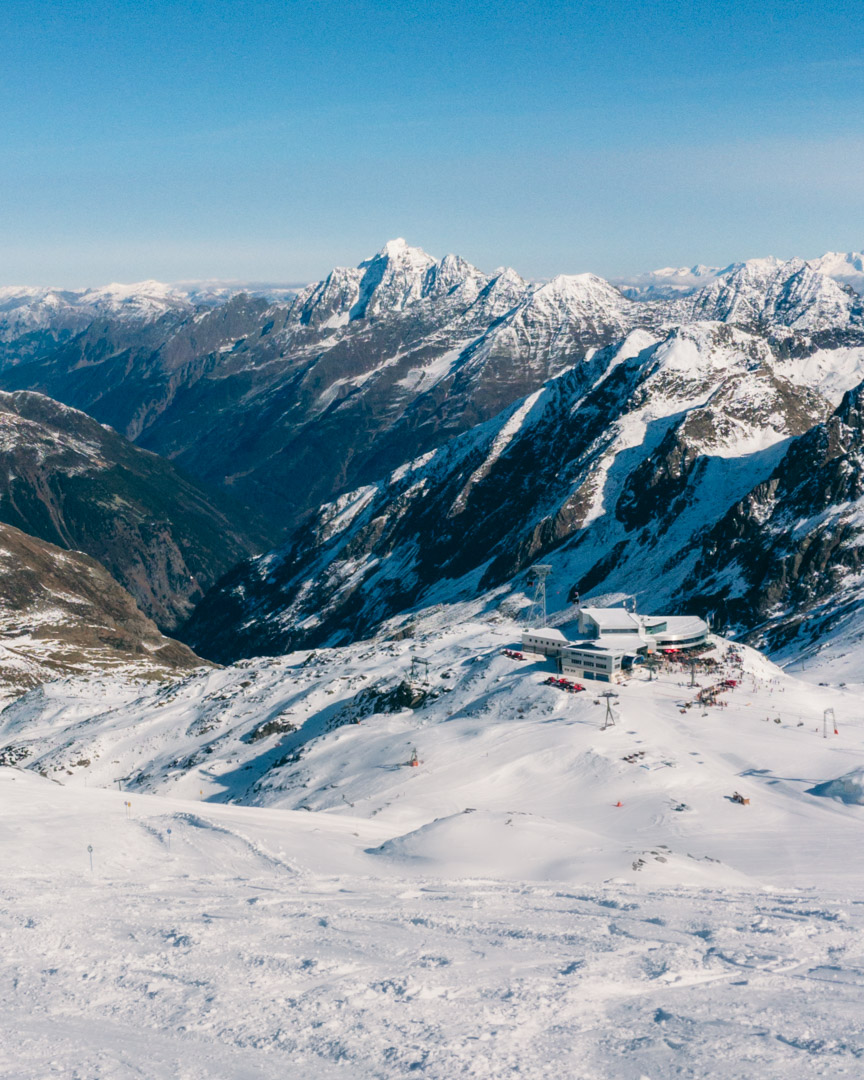 Skiing in October with a clear blue sky