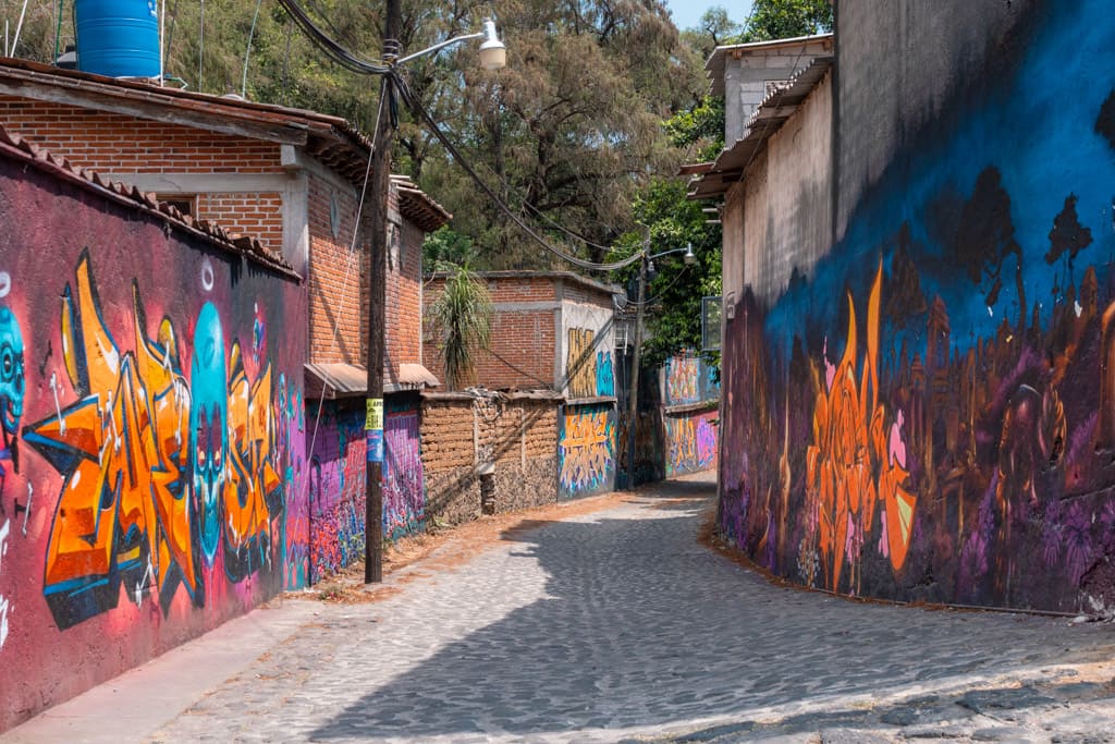 Street full of street art murals in Tepoztlan