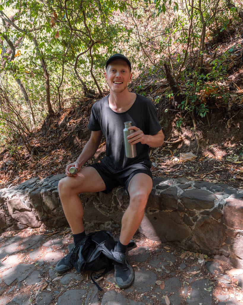 Alex with water bottle on the hike up to Tepozteco