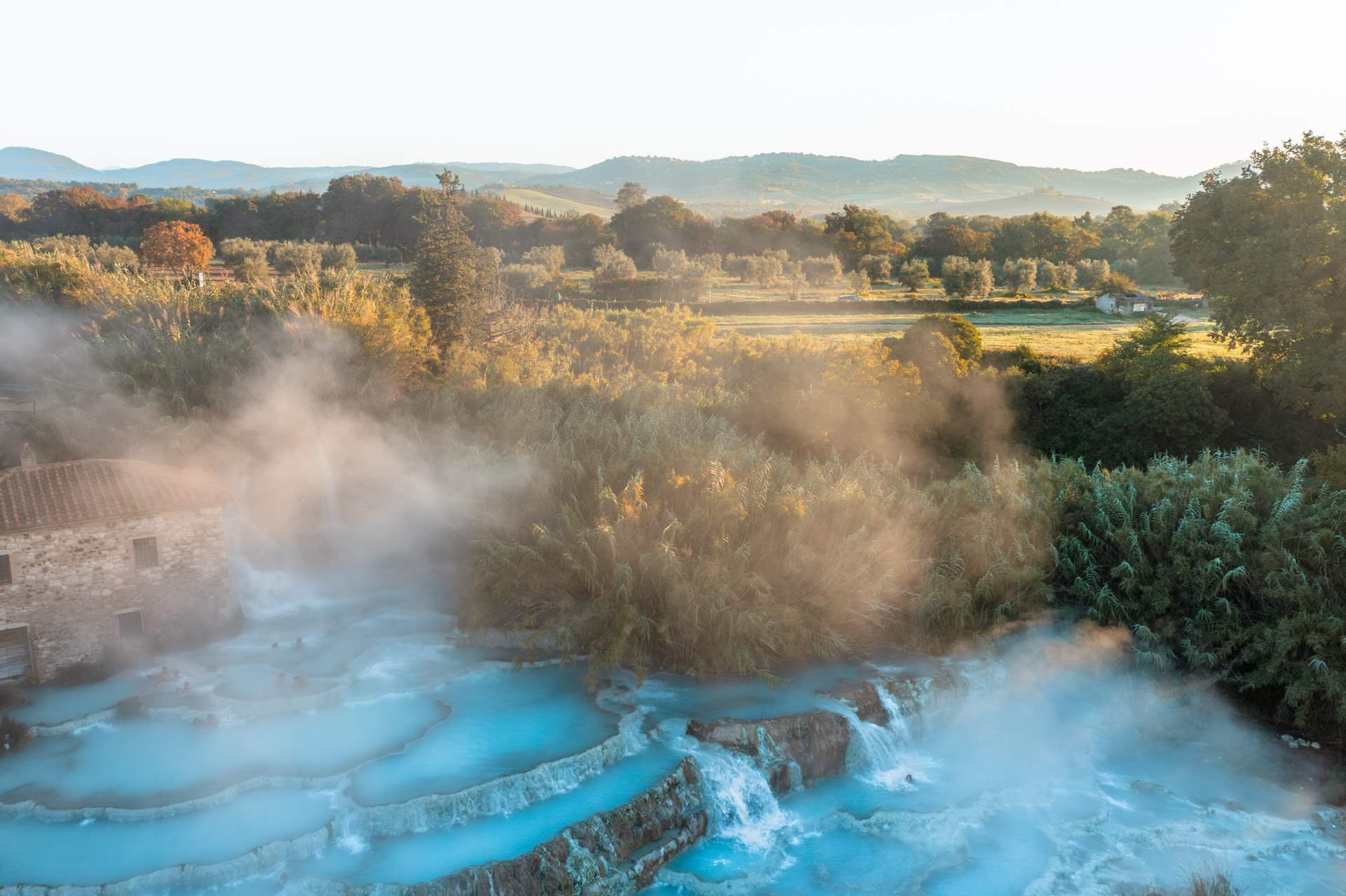 Tuscany hot springs in Saturnia at sunrise