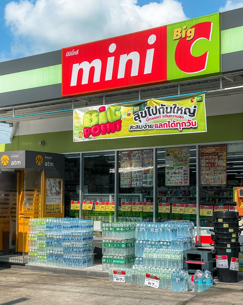 Water bottles in front of a Mini Big C store in Thailand