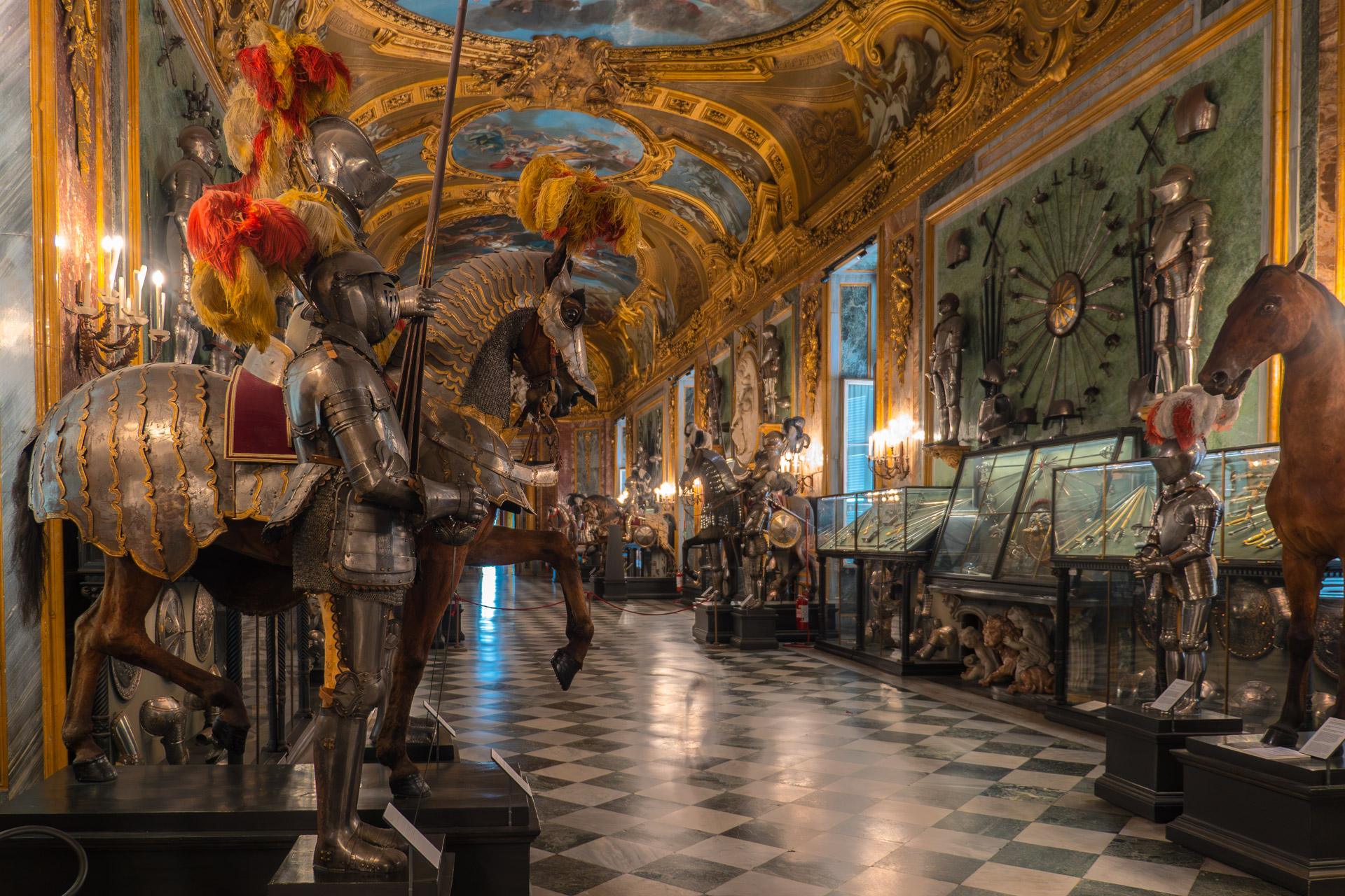 Royal Palace of Turin armoury with a knight and horse in the foreground