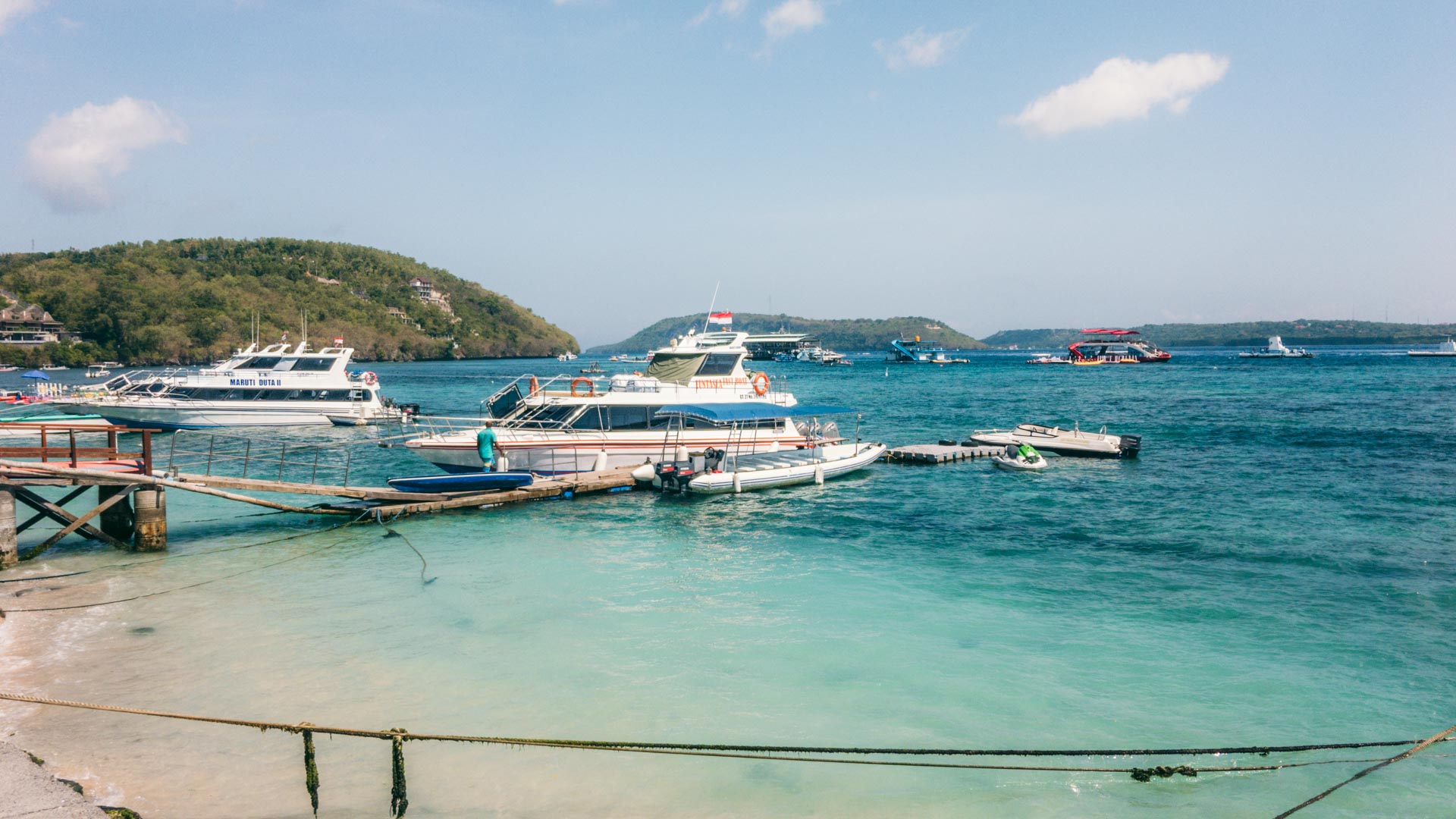 Blue water with boat in Nusa Penida