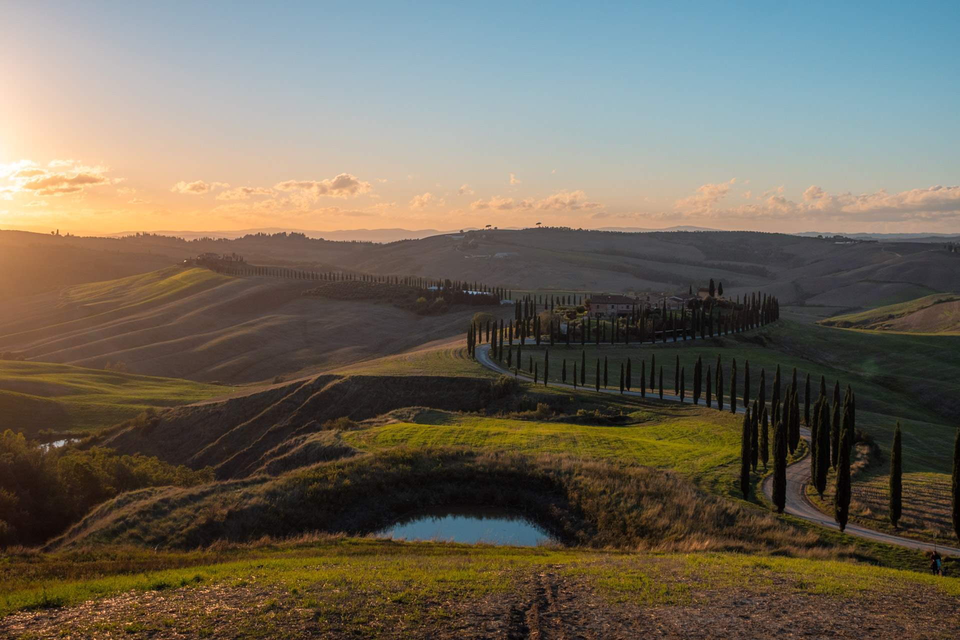 The winding road with cypresses in Tuscany